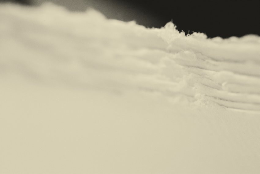Deckled edge of handmade archival cotton paper